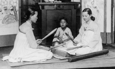 Girls using Korean ironing sticks